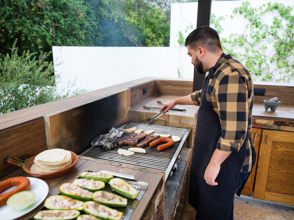 man grilling
