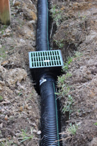 Installing a french drain to help with yard drainage. 