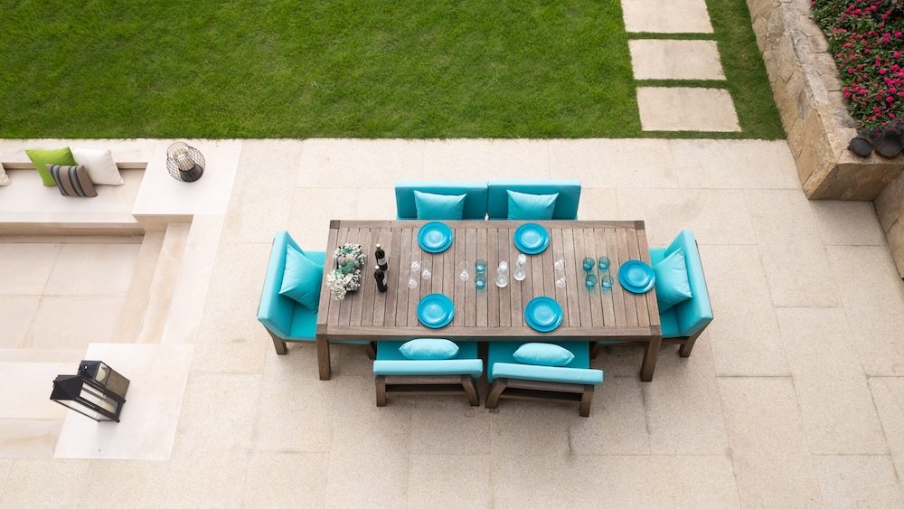 elegant chairs and table outside house