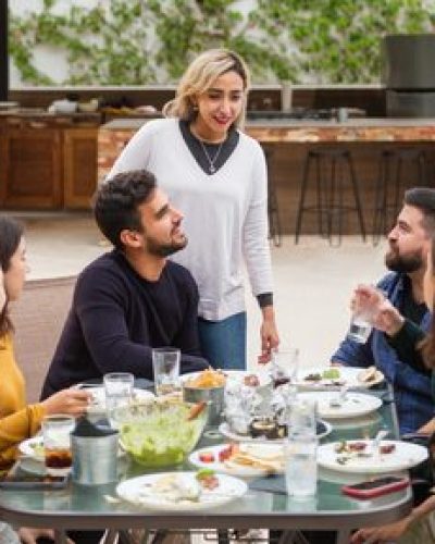 friends dining on patio